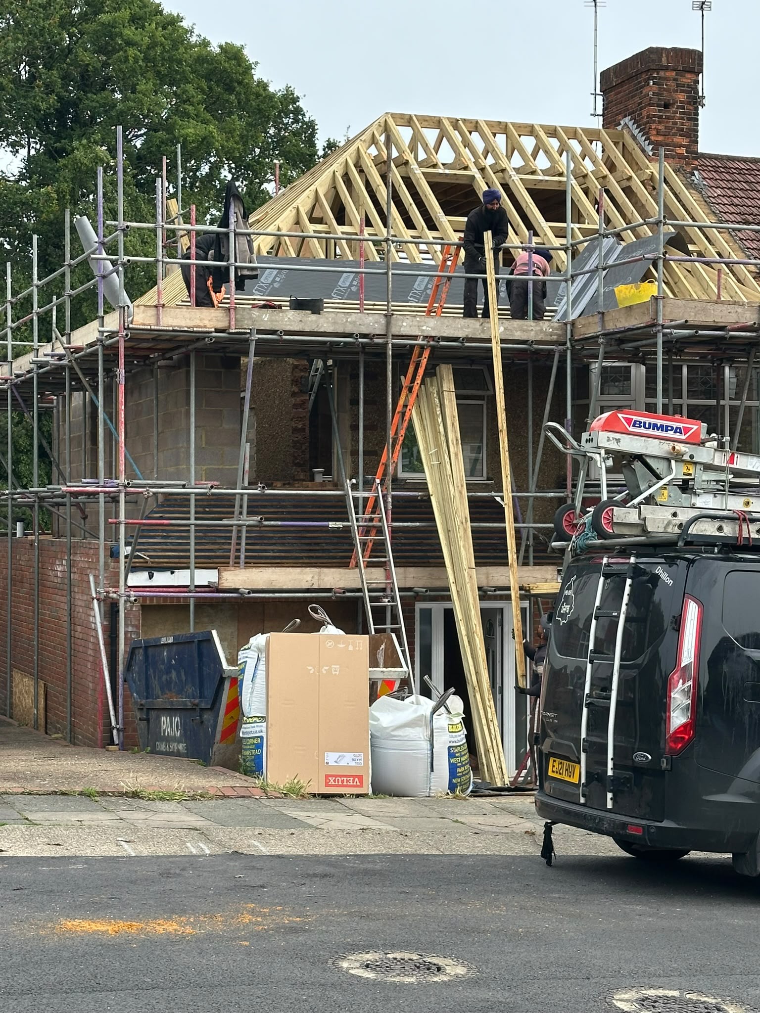 The team working on a new timber roof structure.