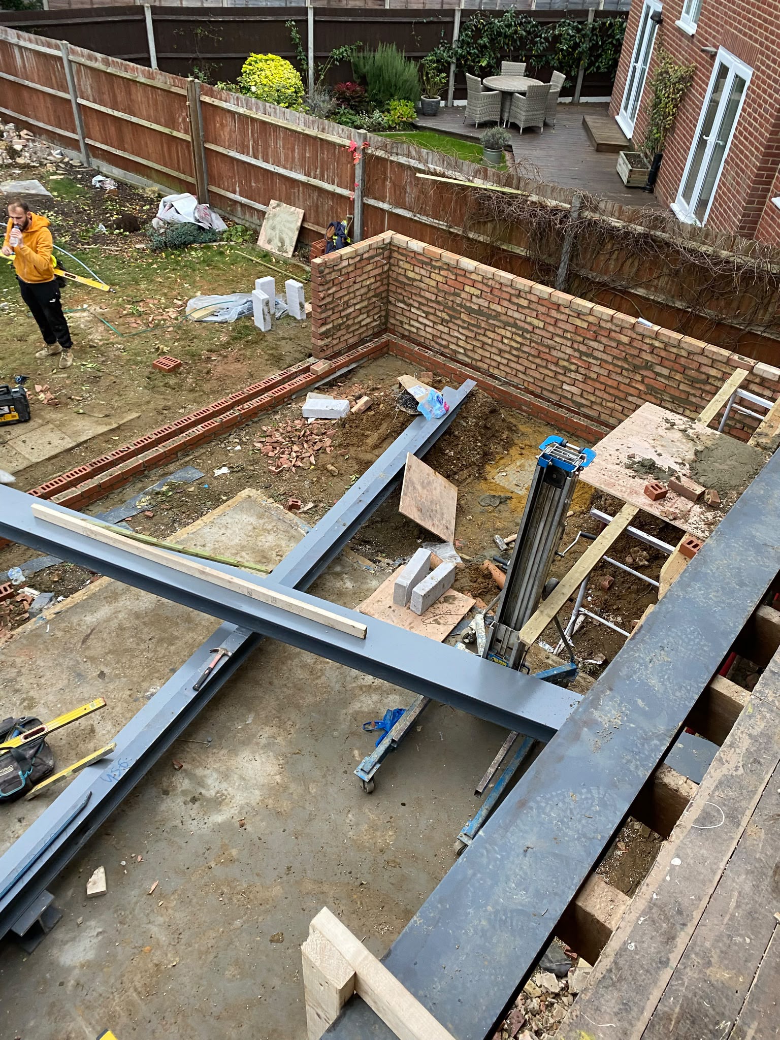 An overhead view of the structural steel and extension brickwork.