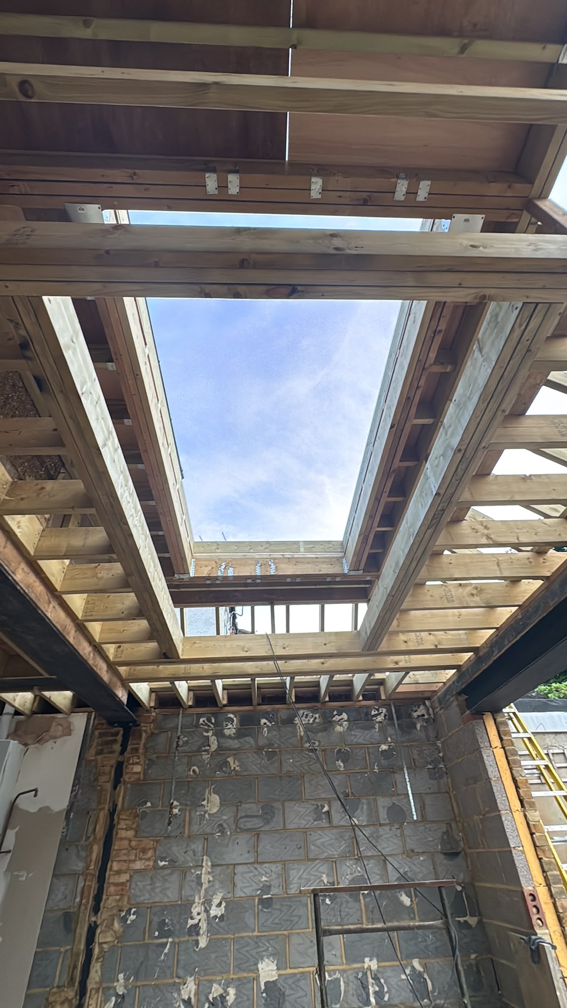 Timber framing around a new rooflight opening.